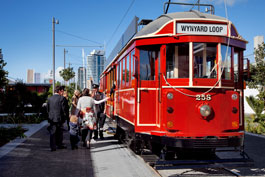 People Queuing to board the Tram
