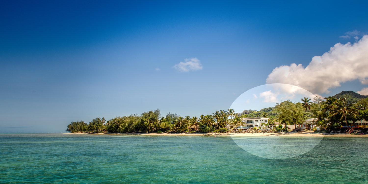 Luxurious living spaces open right onto the white sands of Rarotonga's Muri Beach and Lagoon