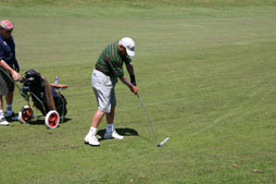 No player should talk, stand close to or directly in the line with the hole, or make any movement that may distract a fellow competitor while making a stroke