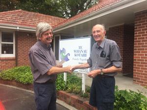 Barry receiving a cheque from the Wesley Methodist Church, Tauranga