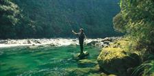 Fly fishing in the river at Treetops Lodge, Rotorua