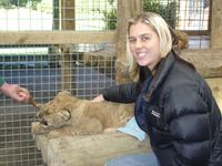 Kelly and lion cub at Paradise Valley
